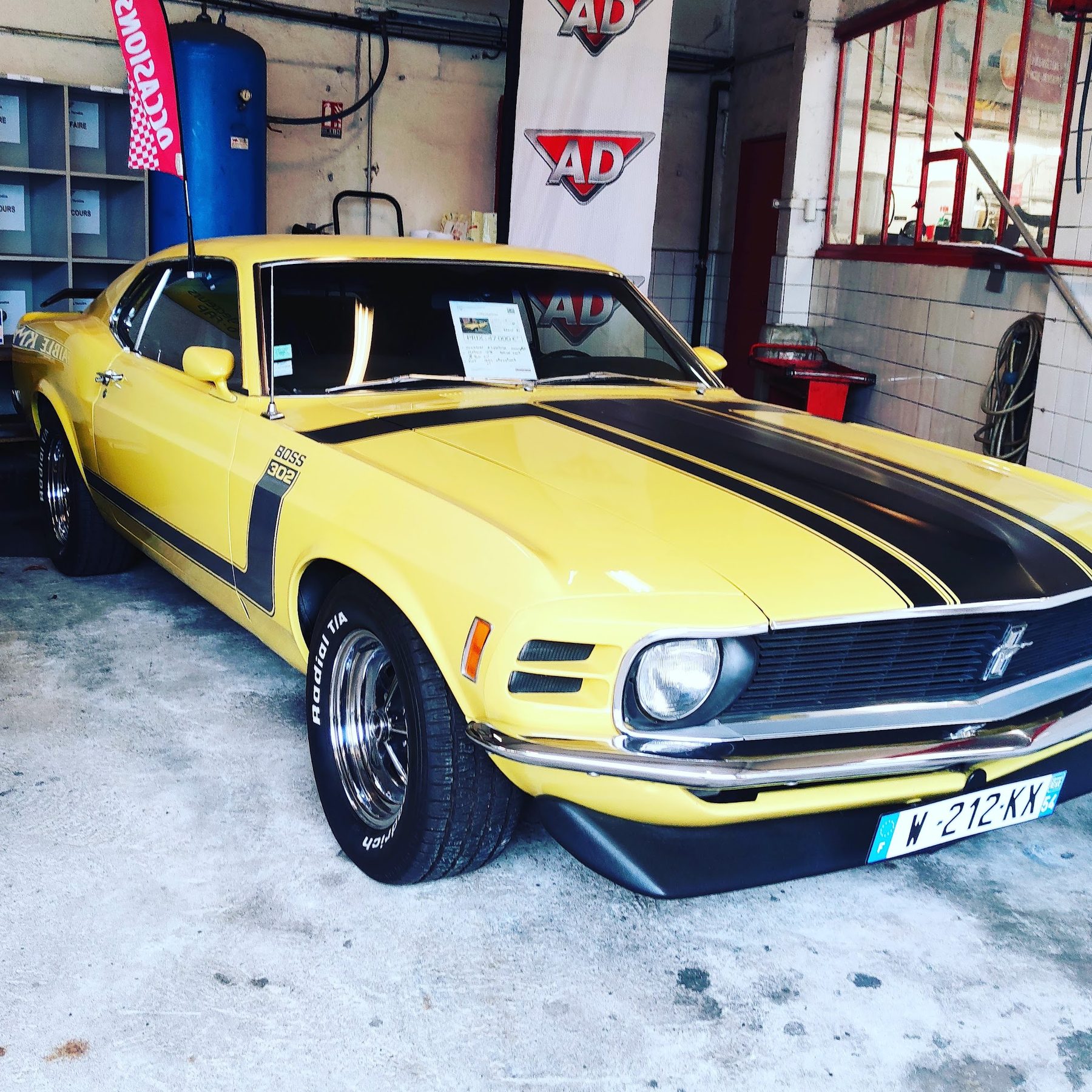 Le coin des occasions du garage, sous les bannières AD